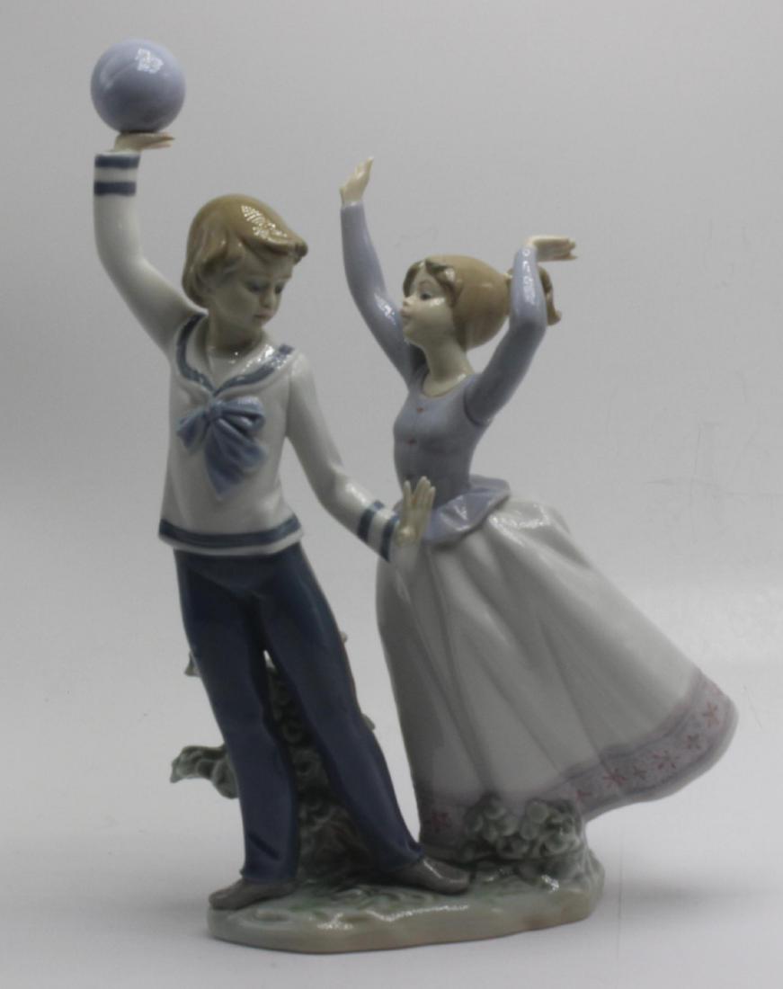 Lladro Porcelain Boy and Girl Playing Ball Figurines (1 of 1)