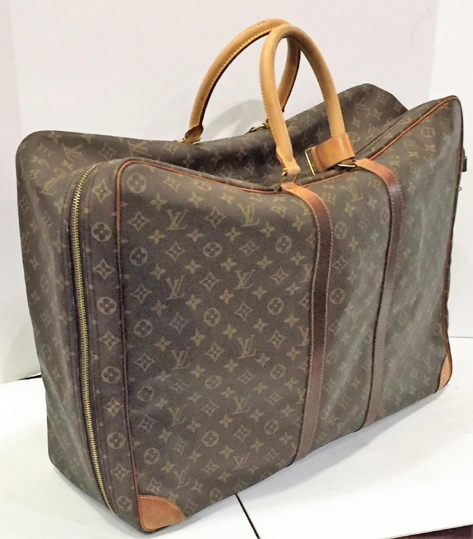 Louis Vuitton monogramed canvas travel bag (1 of 9)
