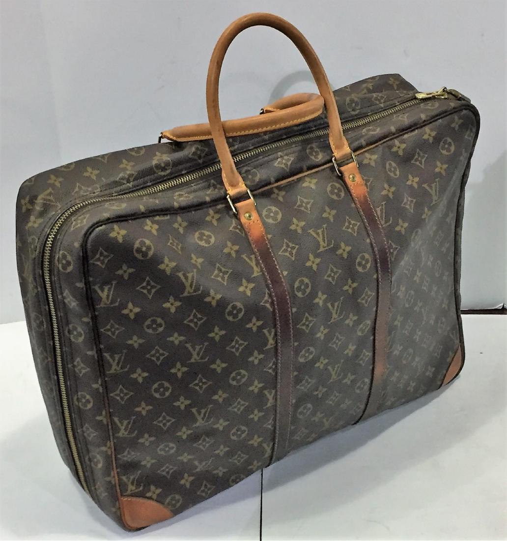Louis Vuitton monogram canvas travel bag (1 of 8)