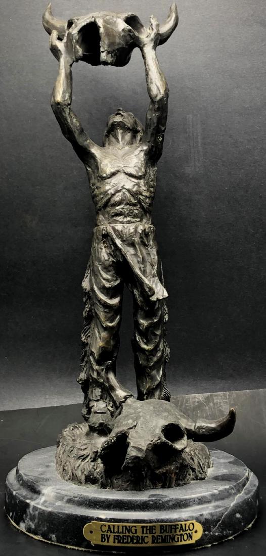 After Frederic Remington Calling The Buffalo Bronze &: After Frederic Remington Calling The Buffalo Bronze & Marble Vase Sculpture. Measures 17" x 8" Wide.