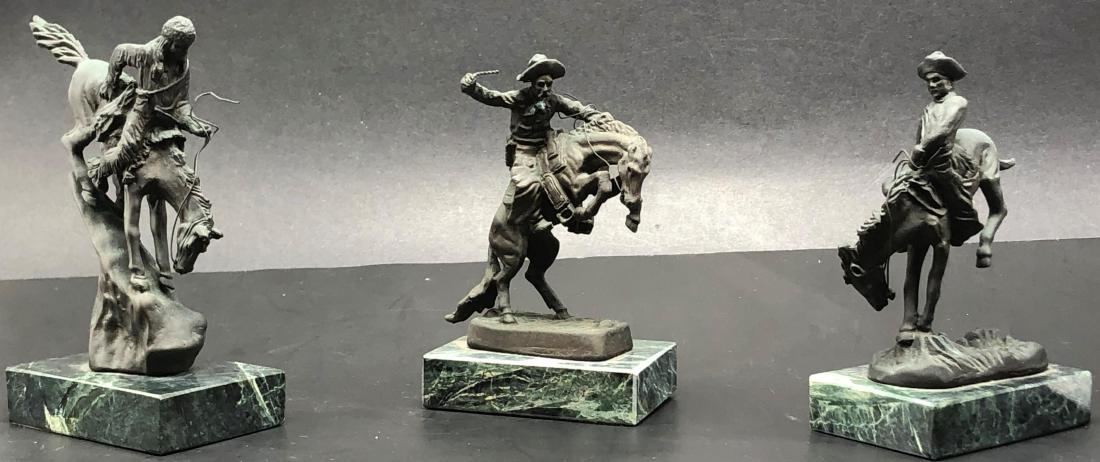 After Frederic Remington Miniature Bronze & Marble Vase: After Frederic Remington Miniature Bronze & Marble Vase Figurines. Meausres 5 5/8" x 4 3/4" x 4 3/4.