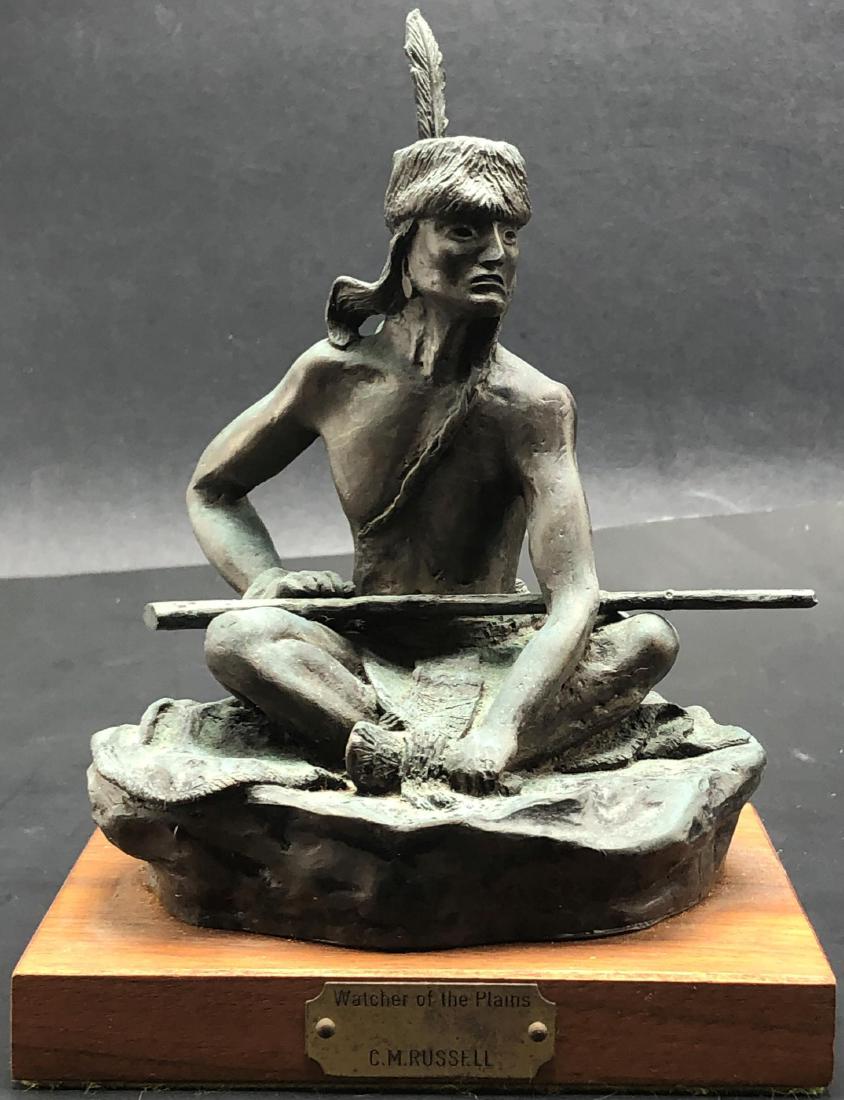 After Charles M. Russell Watcher Of The Plains Bronze &: After Charles M. Russell Watcher Of The Plains Bronze & Wooden Base Sculpture. Measures 7 1/4" High x 4 1/2" Wide x 51/4" Long.