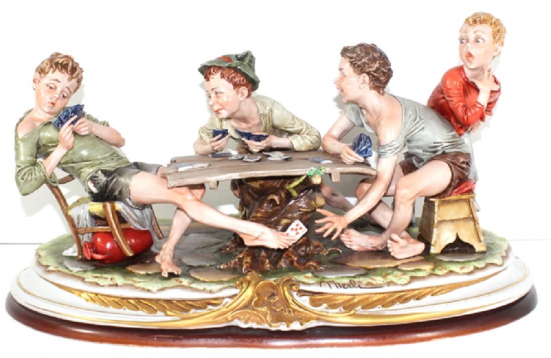 Bruno Merli Capodimonte Porcelain Figure: Bruno Merli Capodimonte Porcelain Figure. Measures - 10" h x 20.5" long.