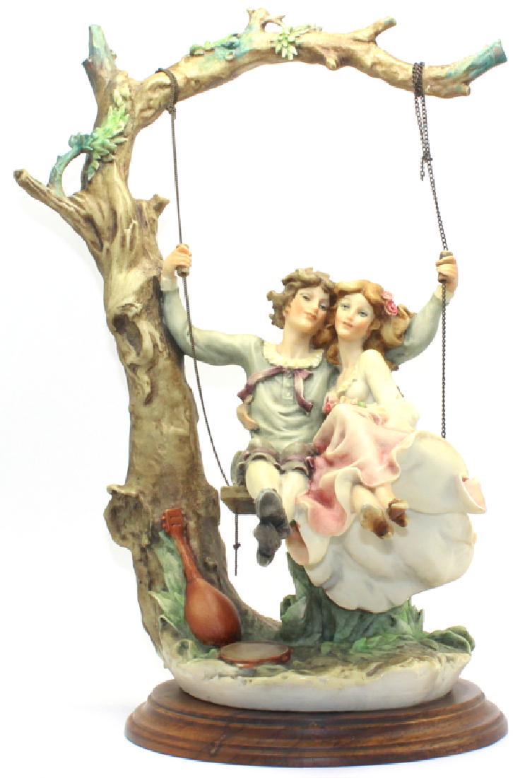 Giuseppe Armani Couple Young Lovers on a Swing: Giuseppe Armani Couple Young Lovers on a Swing. Measures - 17" h x 9" w.