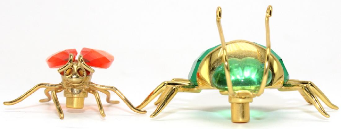 Pair of Daniel Swarovski Crystal Insects: Pair of Daniel Swarovski Crystal Insects. With original box. Measures - 2" long x 1.5" long.