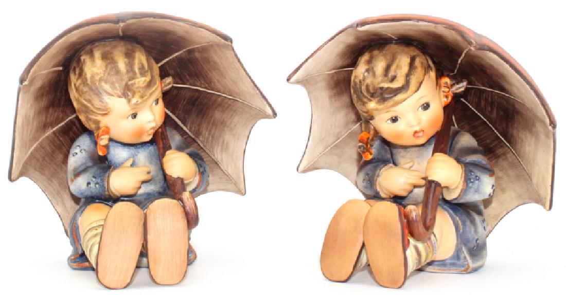 Pair of Hummel Goebel Umbrella Boy & Girl Figurines: Pair of Hummel Goebel Umbrella Boy & Girl Figurines. Measures - 4.75" h.