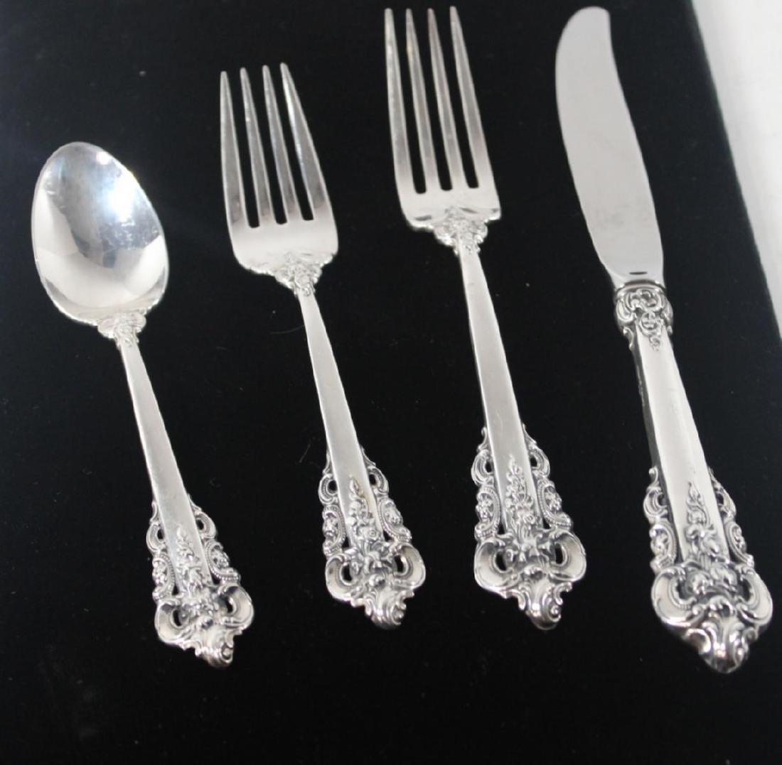 Wallace Grande Baroque Sterling Silver Flatware Set of: Wallace Grande Baroque Sterling Silver Flatware Set of 47 includes 12 knives, 11 forks, 12 tea spoons, and 12 salad forks weighs 68 OZT