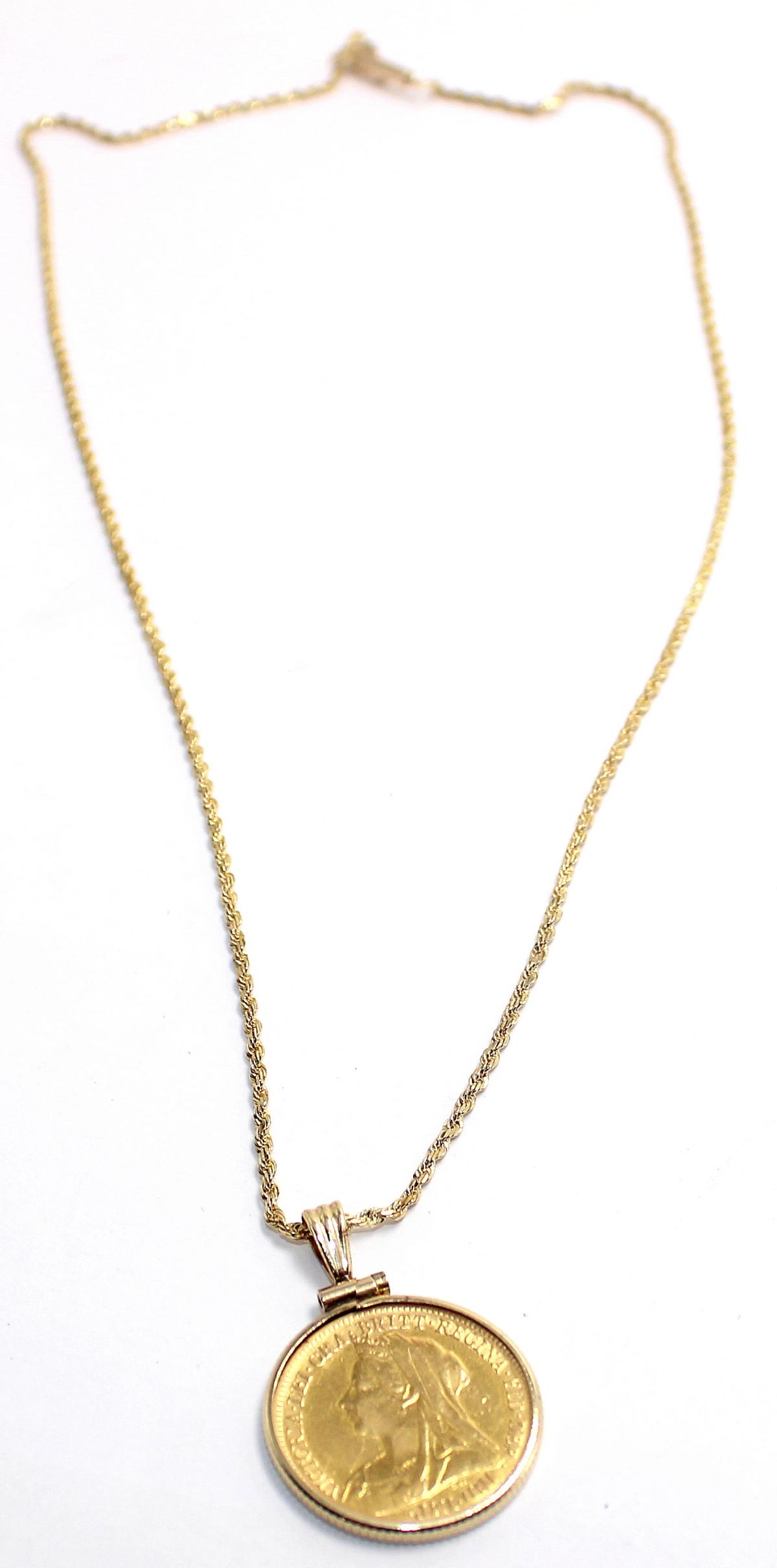 14kt Gold Chain With Half Soverign Coin Pendant: 14kt gold chain with 1901 great britain half soverign coin pendant measures 18"