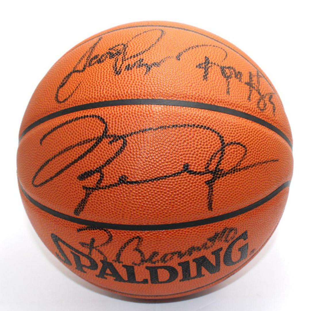 Chicago Bulls 1996 Team Autographed Basketball: Team signed 1996 NBA season basketball autographed and dated. Signed by Michael Jordan following return from retirement