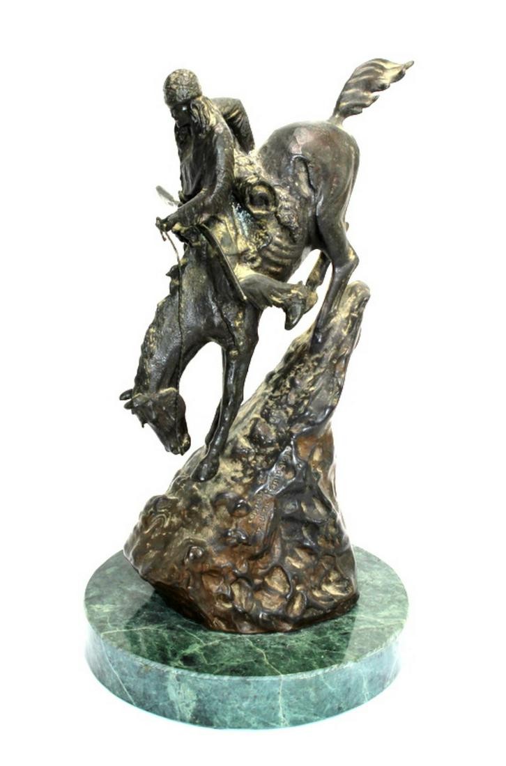 Small After Frederic Remington Bronze Sculpture: Small after Frederic Remington (1861-1909) the mountain man bronze sculpture on green marble base signed measures 10" H