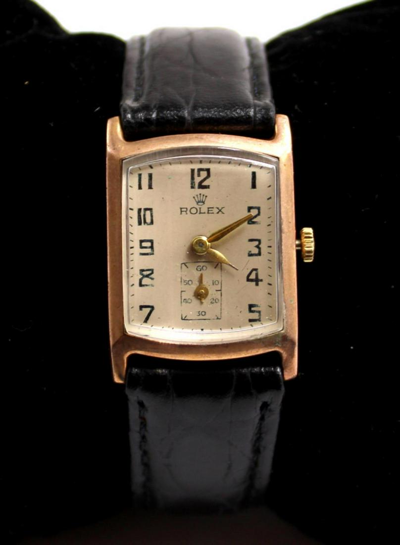 1934 Rolex Tank Watch: 1934 rolex tank watch signed original dial and movement crown and case. Serial number 68234 comes with alligator strap and rolex buckle. Not in working condition