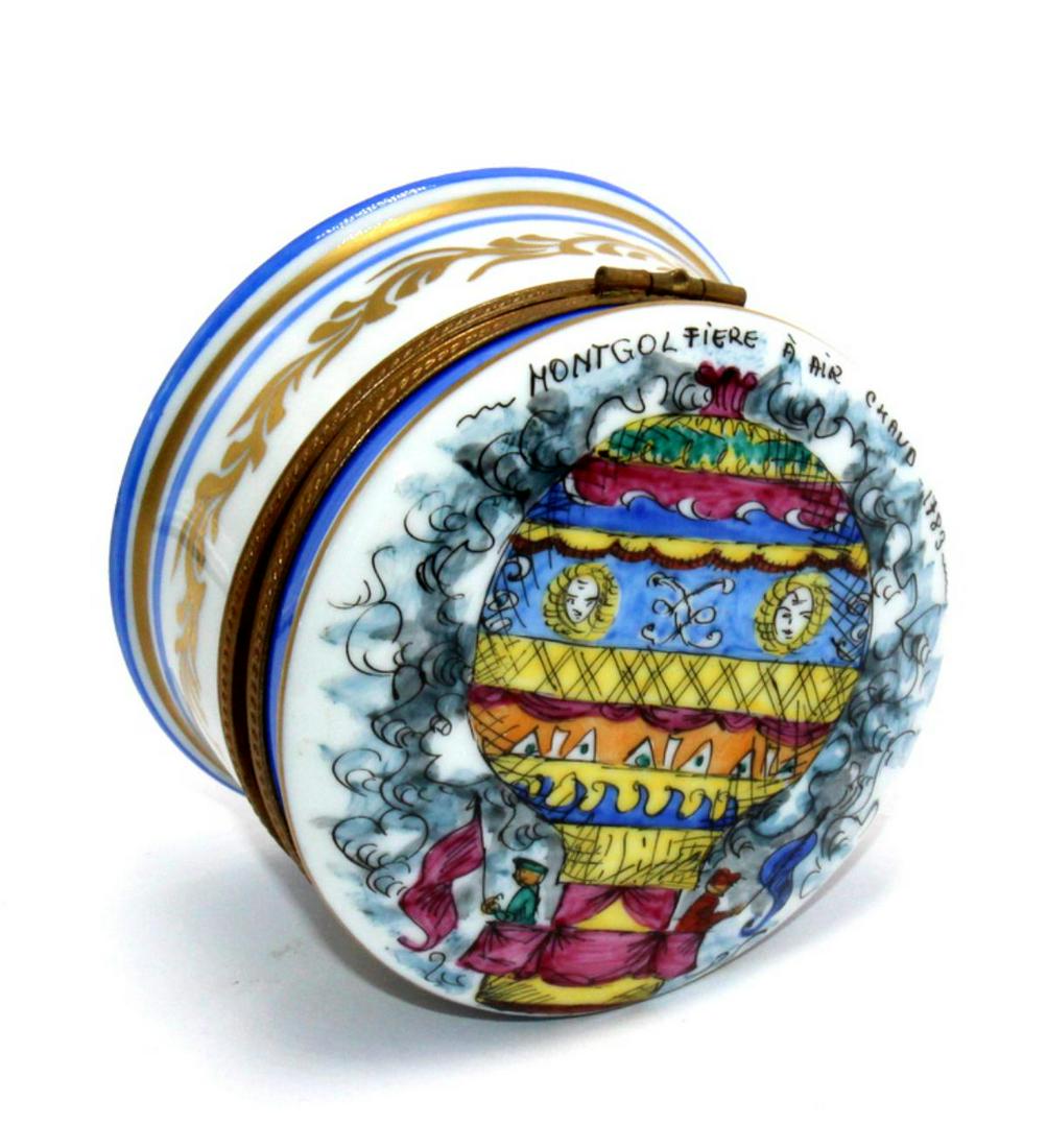 Limoge France Hand Painted Clock Trinket Box: Limoge France hand painted clock porcelain trinket box marked Limoge France paint main measures 1 1/2" x 2 3/4" DIA