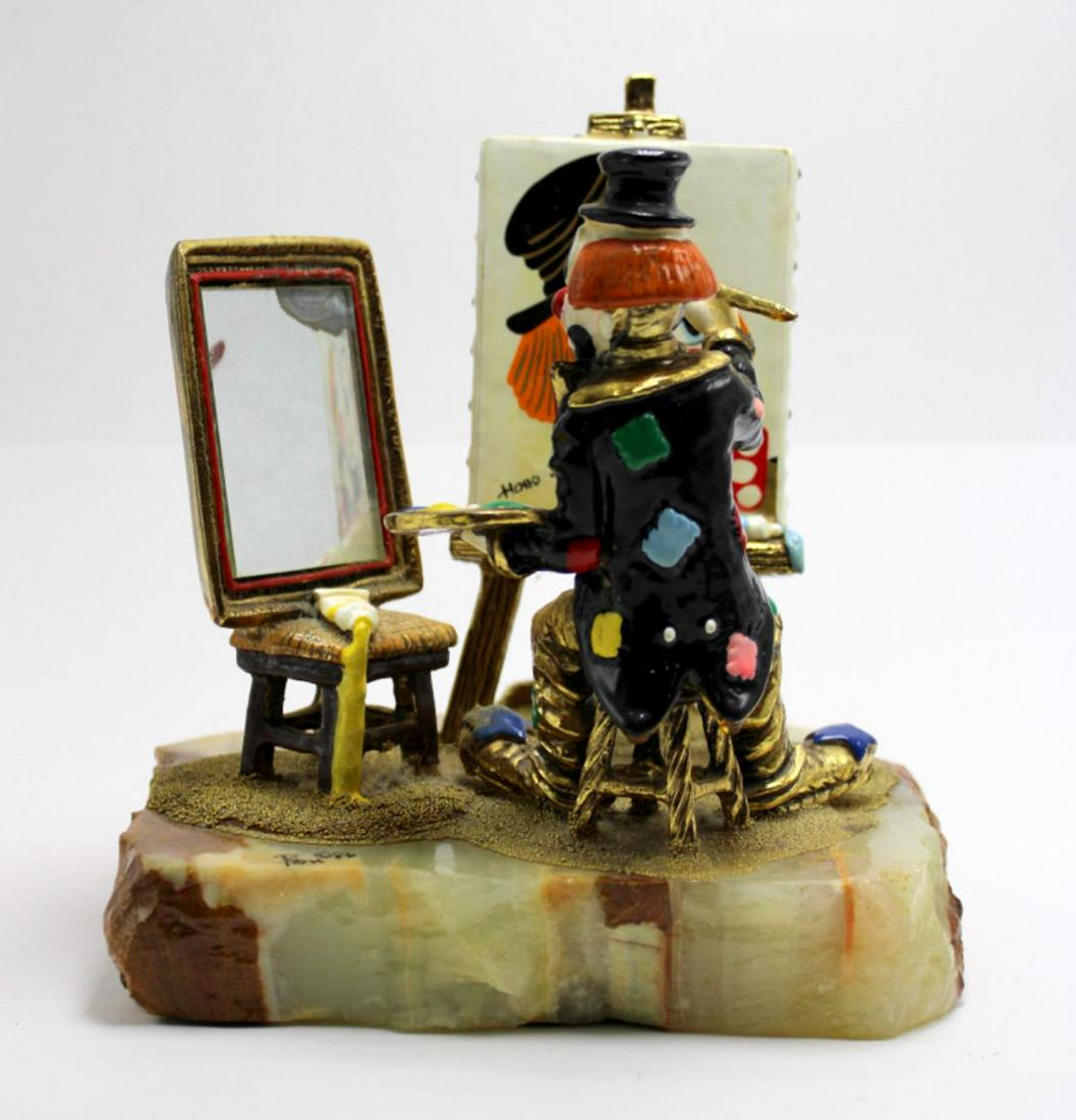 Signed Ron Lee Clown Painting a Self Portrait: Signed Ron Lee clown painting a self portrait measures 7" x 6" x 9"