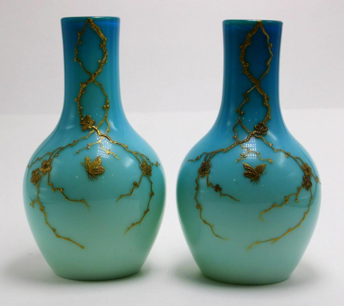 Pair of Thomas Webb Blue Satin Glass Vases: Pair of Thomas Webb blue satin glass vases with gilt enamel decorations of branches and butterflies measures 6 1/2"