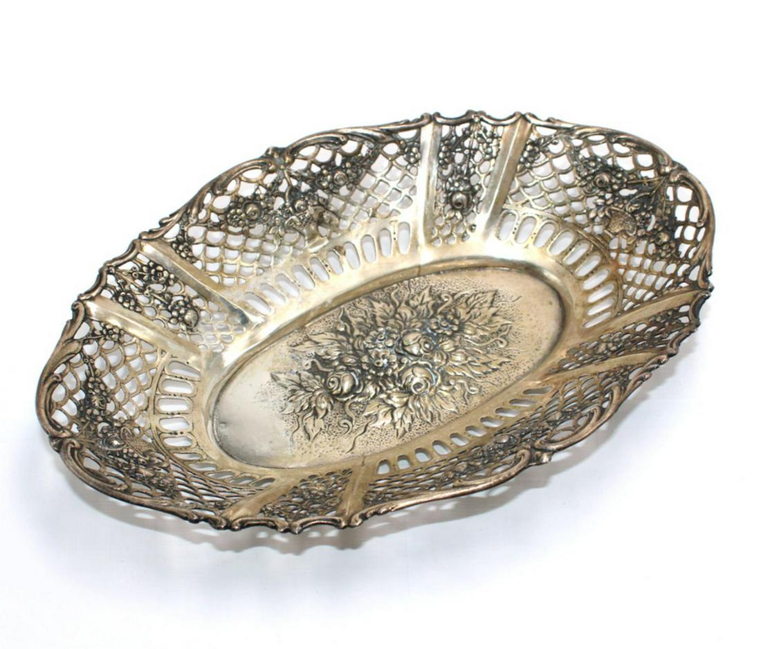 Germany 800 Silver Pierced Bread Basket: Germany 800 silver pierced bread basket measures 1 1/2" H x 9" L x 6 1/2" W weighs 8 OZT