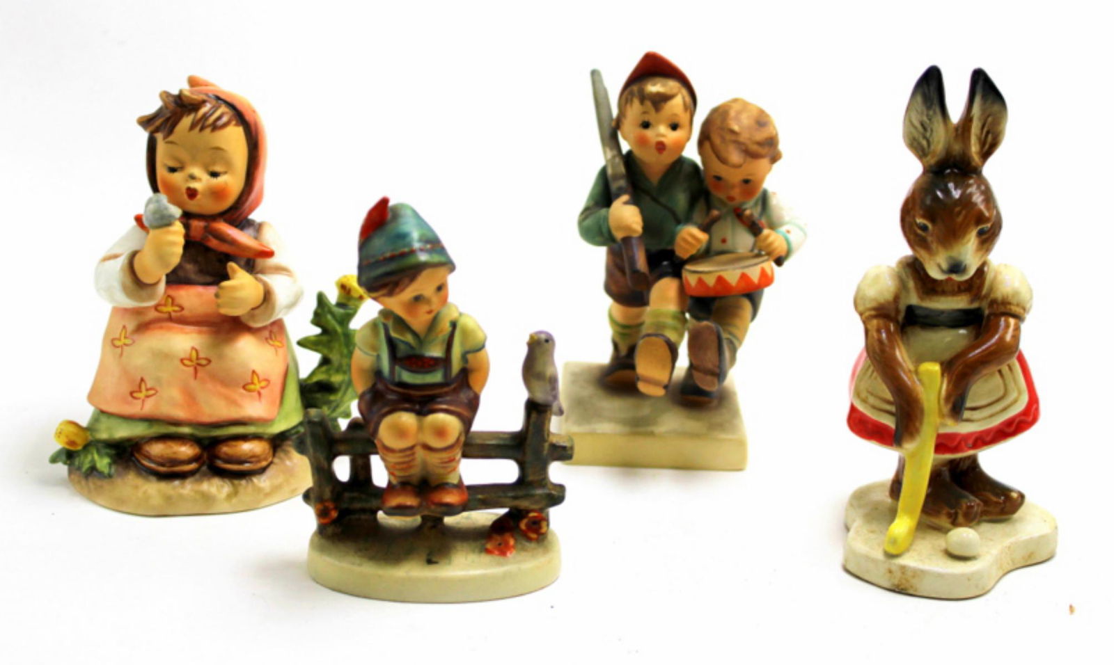 Four Goebel Hummel Figurines: Four Goebel Hummel figures measures 5" x 4" High