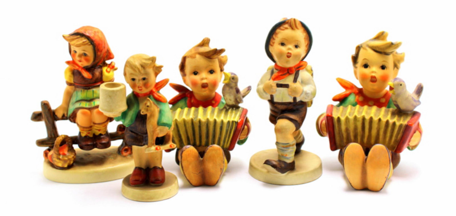 Five Hummel Figurines: Five Hummel figurines includes just resting, let's sing, school boy and boy with toy horse measures 4" x 3 1/2"