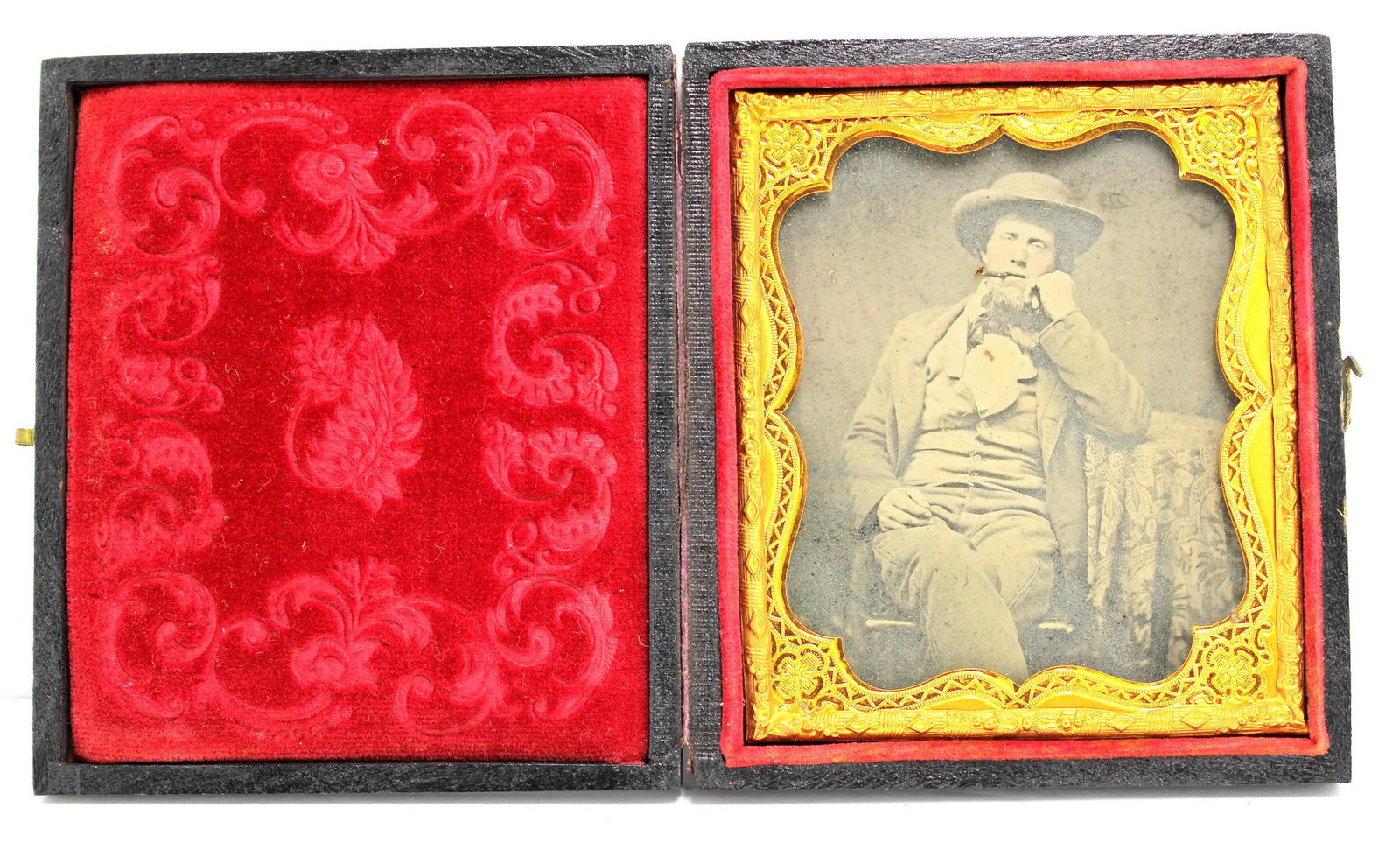 Civil War Era Tin Type Soldier Photo: Civil war era tin type soldier photo seated confederate in tray suit and hat in original case measures 3 5/8" x 3 1/4"