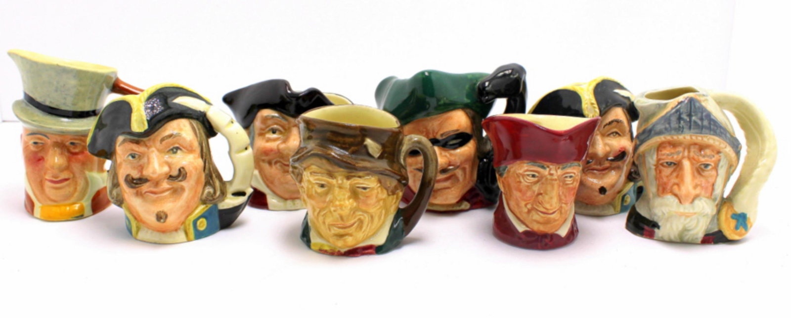 8 Miniatures Royal Doulton Toby Mugs: 8 miniatures Royal Doulton toby mugs includes Dick Turpin, Lancaster handland, capt henry morgan, mine host and another moeasures 2 1/2" x 2" x 2 1/2"