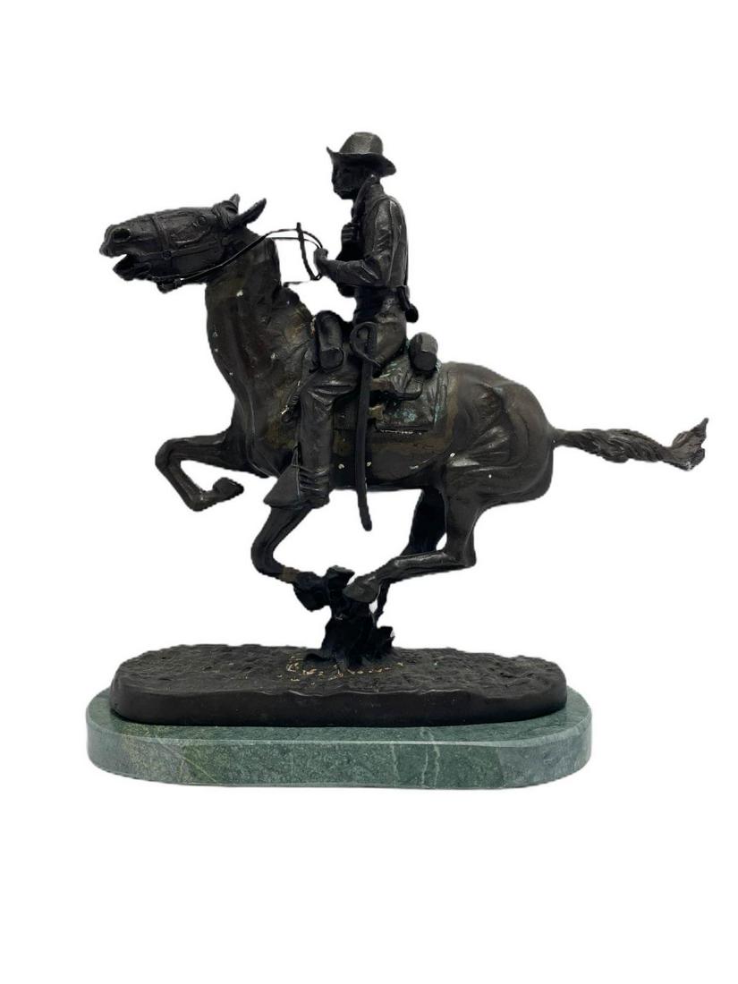 After Frederic Remington Bronze Sculpture on Green: After Frederic Remington bronze sculpture on green marble base of the plain measures 10" x 10"