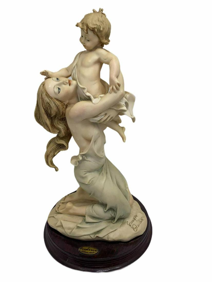 Giuseppe Armani Florence Mother with Baby Figurines: Giuseppe Armani Florence Mother with Baby Figurines measures 13" High