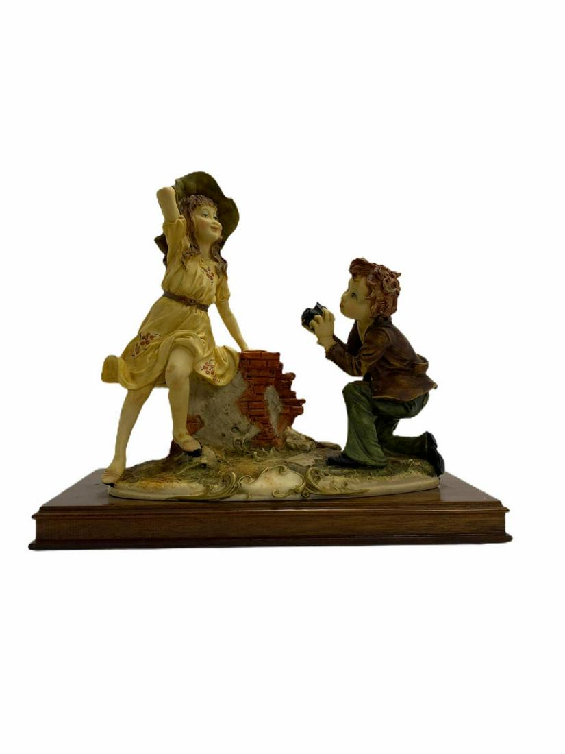 Capodimonte Porcelain Figurines The Photographer: Capodimonte Porcelain Figurines The Photographer measures 10" H x 11" L x 5 1/2" W