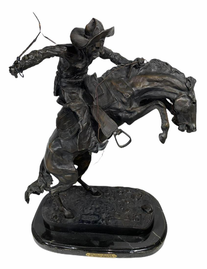 After Frederic Remington Bronze Sculpture Bronco Buster: After Frederic Remington (American, 1861-1909) Bronze Sculpture Bronco Buster on Marble Base measures 24" H x 17" L