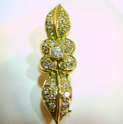 18KT TT ITALIAN ANTIQUE DESIGN DIAMOND BROOCH: 18 kt Two Tone Italian Antique Design .82 cts Diamond Brooch, G-H Color, SI1 Clarity. SHIPPING AND REQUIRED INSURANCE $18 WITHIN THE CONTINENTAL US. FOR INTERNATIONAL SHIPPING QUOTES PLEASE EMAIL US A