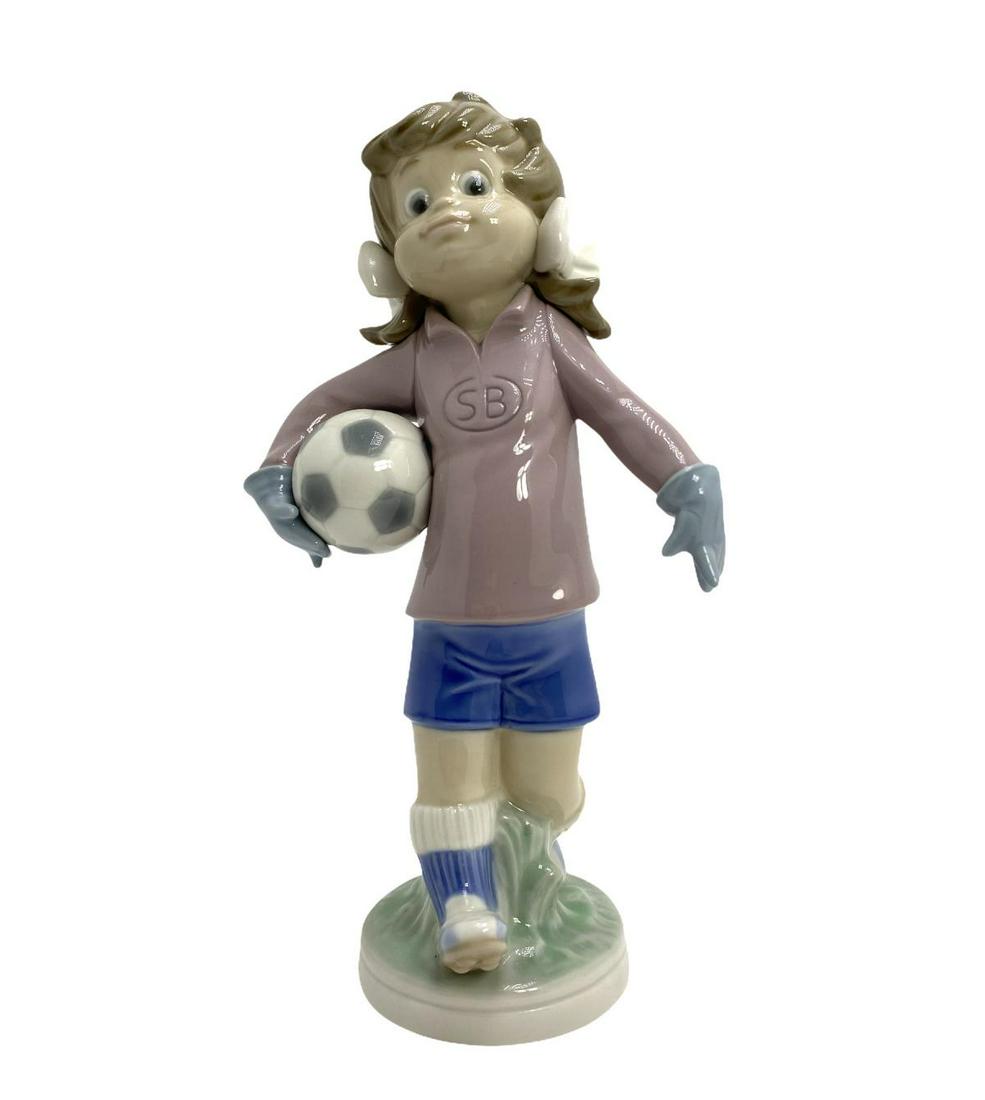 Lladro Sport Billy Porcelain Figure: Lladro Sport Billy Porcelain Figure measures Height: 9"