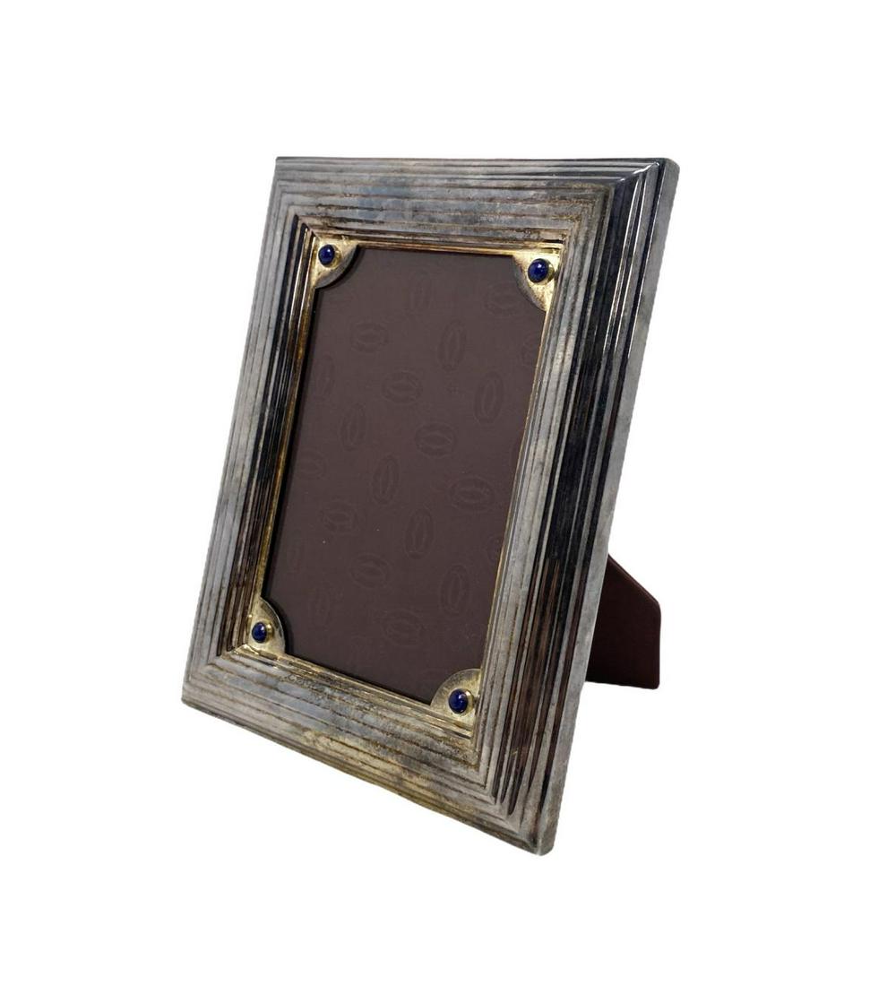 Cartier Silver Plate and Lapiz Lazuli Picture Frame: Cartier Silver Plate and Lapiz Lazuli Picture Frame measures Height: 7" x Diameter: 5 1/4"