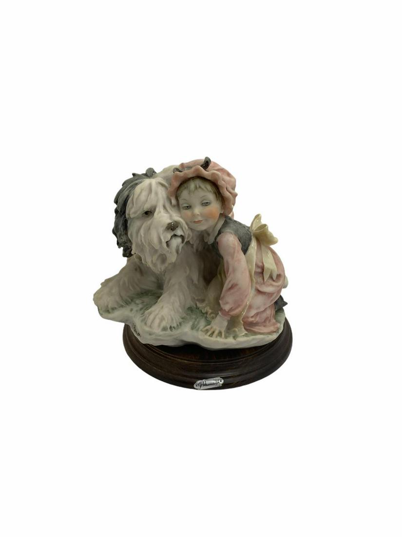 Giuseppe Armani Florence Girl with Shaggy Dog Figurines: Giuseppe Armani Florence Girl with Shaggy Dog Figurines measures Height: 7"