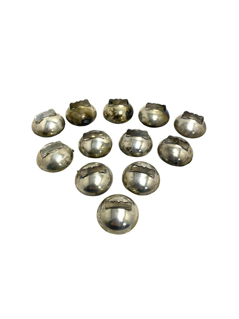 Twelve English Sterling Silver Place Holders. Place: Twelve English Sterling Silver Place Holders. Place holders have an English London Halmark 190809