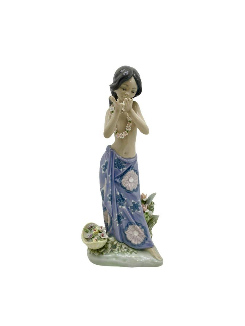 Lladro #1480 Aroma of the Islands Porcelain Figure: Lladro #1480 Aroma of the Islands Porcelain Figure measures Height: 9 1/2". Missing flowers, sold as is
