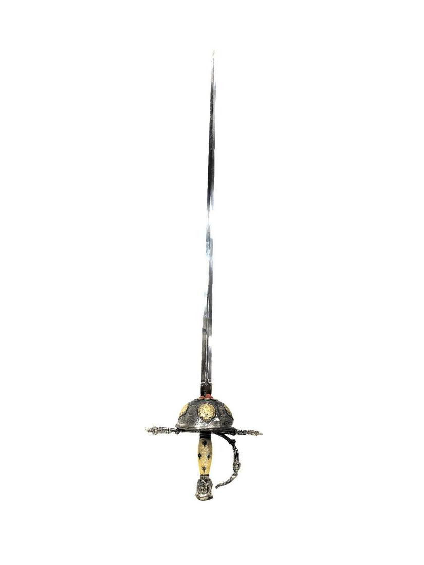 Three Musketeers Rapier Sword by Marto of Toledo Spain: Three Musketeers Rapier Sword by Marto of Toledo Spain engraved blade M made in Spain measures Length: 45". Purchased new over 40 years ago with labeled original price $325.99