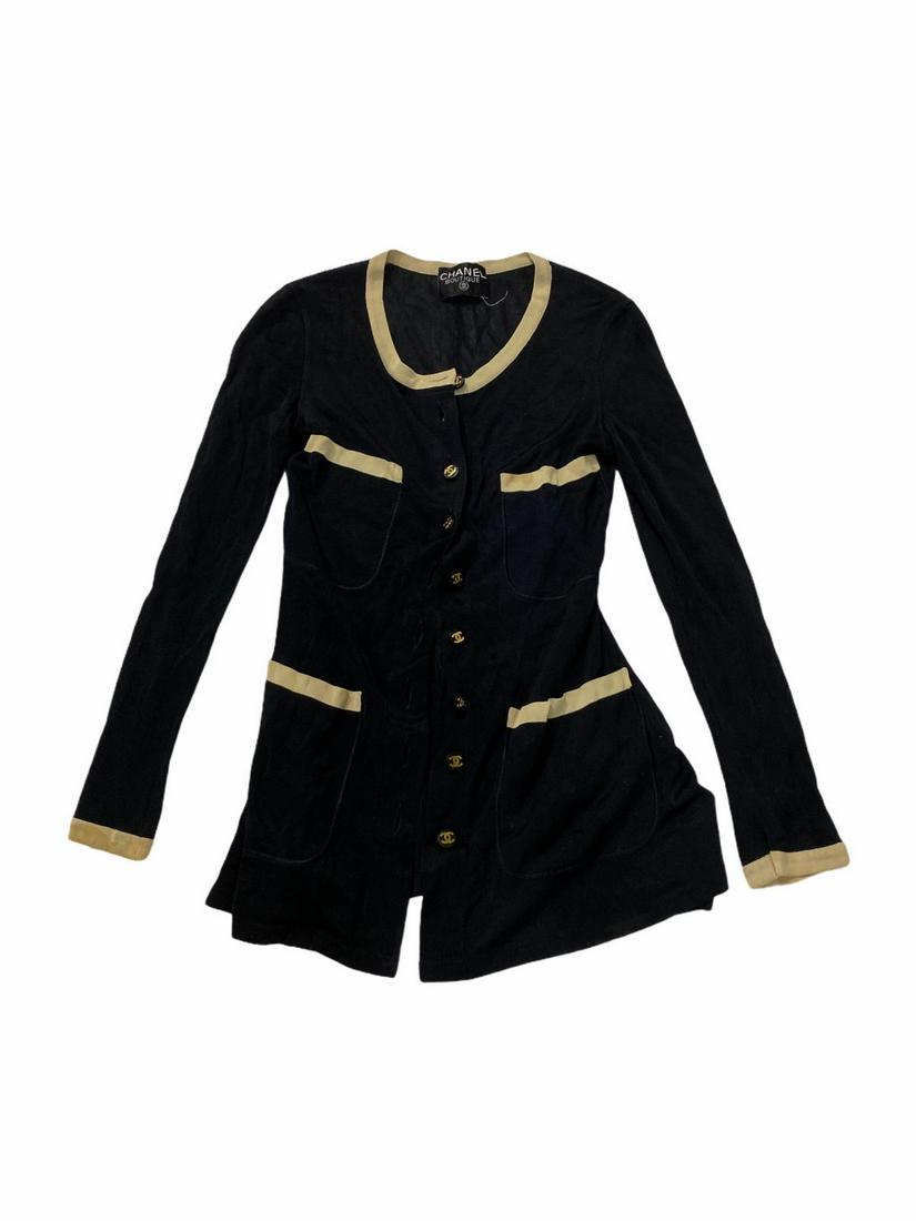 Authentic Chanel Navy Sweater with Bone Accent: Authentic Chanel Navy Sweater with Bone Accent. Some stains on bone areas, sold as is.