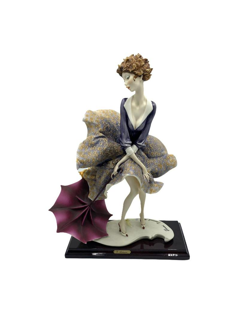 Giuseppe Armani Florence Sculpture The Umbrella Autumn: Giuseppe Armani Florence Sculpture The Umbrella Autumn measures H: 15" x W: 9" x D: 5"