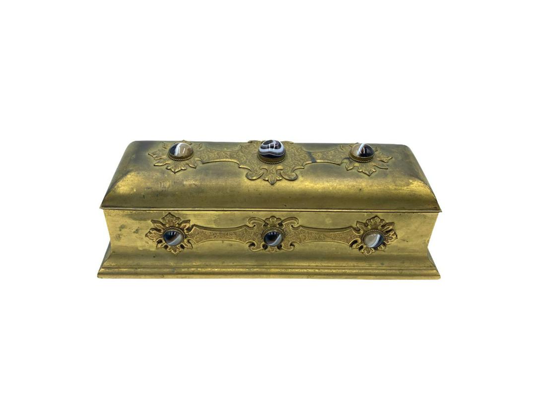 Auguste Klein and Cie Gilt Metal Jewelry Box with: Auguste Klein and Cie Gilt Metal Jewelry Box with Cabochon Agate Stone Inlaid measures H: 3 1/2" x L: 11 1/2" x W: 4 1/2"
