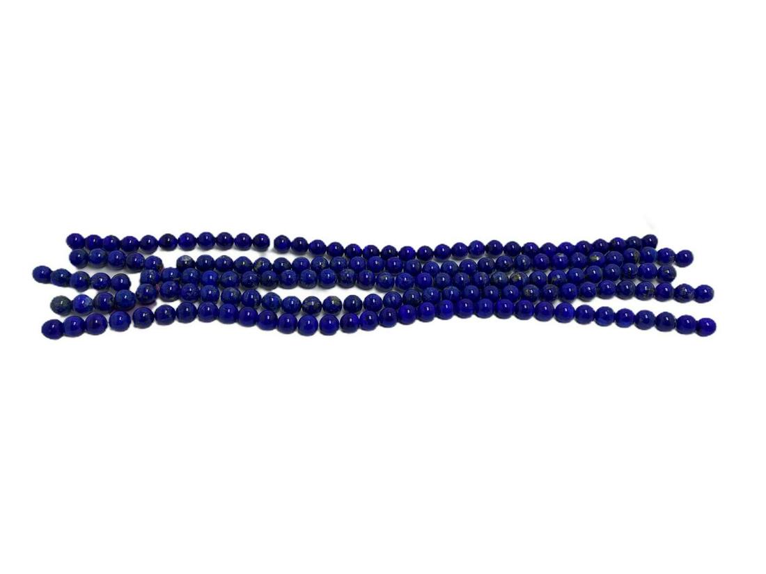 Five Lapis Lazuli Beads: Five lapis lazuli beads measures 16" L