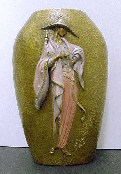 ERTE BRONZE 'CHAPEAU' FIGURAL VASE: Erte Polychrome Figural "Chapeau" Vase, depicting a woman on each side. In Art Deco Clothing. Height 9 3/4" SHIPPING & REQUIRED INSURANCE $50.00 WITHIN THE CONTINENTAL U.S., FOR INTERNATIONAL SHIPPING
