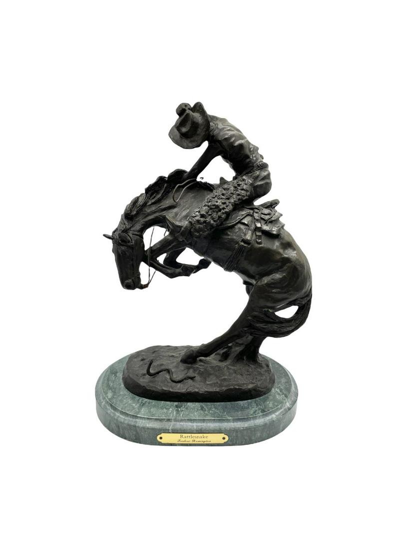 After Frederic Remington (American, 1861-1909): After Frederic Remington (American, 1861-1909) Rattlesnake Bronze Sculpture on Marble Base measures 14" x 10" x 7"