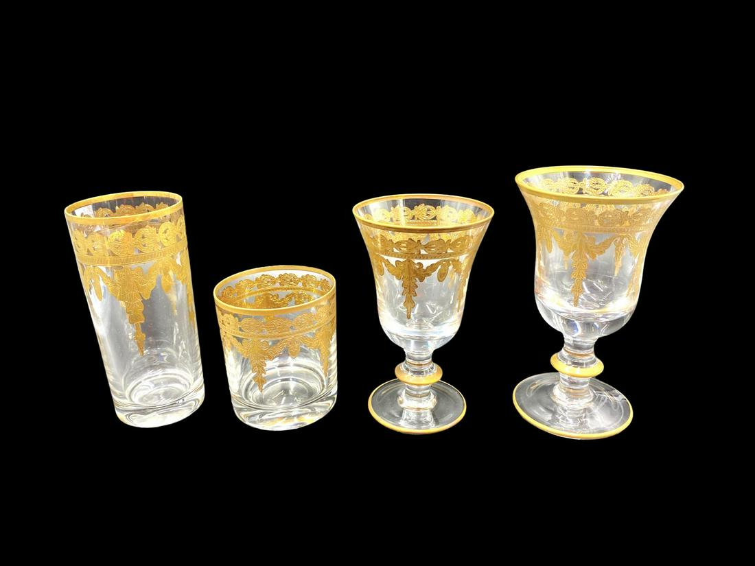 Arte Italica Gilt Glassware 1481 Italian Glassware Set: Arte Italica Gilt Glassware 1481 Italian Glassware Set of 48 Glasses by Arte Italics. The pieces are in the vetro gold pattern. The set includes 12 of each highball glasses, old fashioned glasses, wat