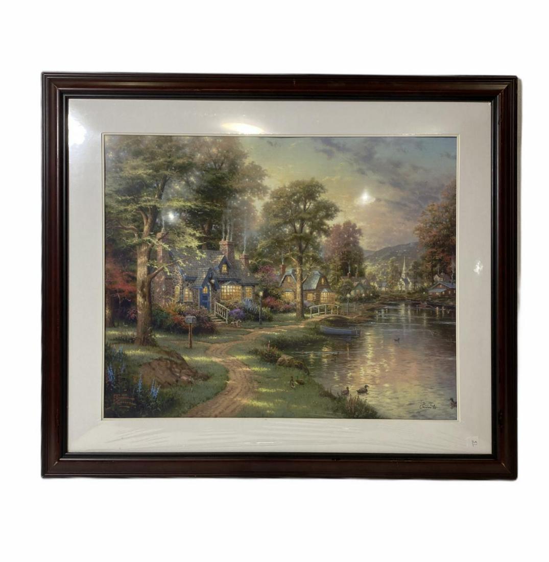 Signed Thomas Kinkade Lithograph in Color on Premium: Thomas Kinkade (American, 1958-2012) Lithograph in Color on Premium Paper Hometown Lake 1997 signed and numbered 654/1210 measures 23" H x 29" W, 5" frame and matte. Comes with appraisal for $485