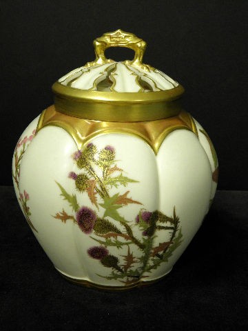 Royal Worcester Hand Painted Potpourri Vase: Top quality Royal Worcester Potpourri Vase with both solid inner and pierced outer covers. The blush ivory ground being decorated with hand painted floral patterns. The lids, top and bottom of this va