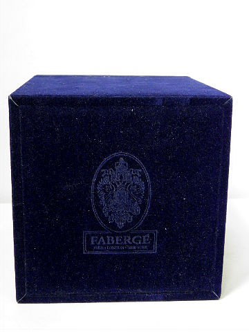 Limited Edition Box LRoyal Blue Limoges/Faberge Egg: A wonderful limited edition Faberge egg manufactured by Limoges for Faberge. The Royal blue body is decorated with gold stars and has gilt metal mounts. The gilt metalinterior holding a globe of the e