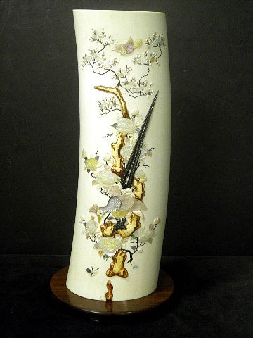 Shibayama Ivory Tusk Vase & Stand: Large Shibayama Ivory tusk vase & stand. The hollowed tusk decorated with mother of pearl, abolne, and ivory forming a scene of trees,flowers,and birds. The back having a raised signed seal. Approx 14