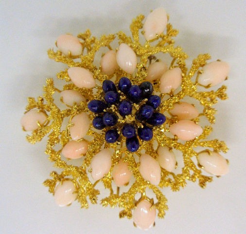 18K Angel Skin Coral & Lapis Lazuli Broach: Circa 1970s fabulous 18k Yellow Gold Angel Skin Coral & Lapis Lazuli Branch Pin. These beautifully hand crafted pin has 21 marquise cabochon set in a magnificent tree branch style mounting. This brooc