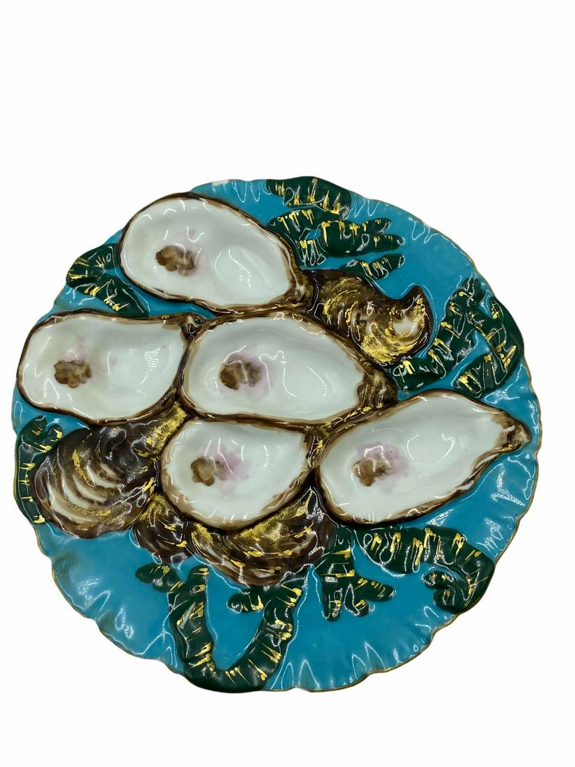Haviland and Co Limoges Porcelain Turkey Oyster Plate: Haviland and Co Limoges Porcelain Turkey Oyster Plate in Mediterranean Sea Blue, Copper Bronze and Seaweed Green Colors measures DIA: 9". Has minor chips, sold as is