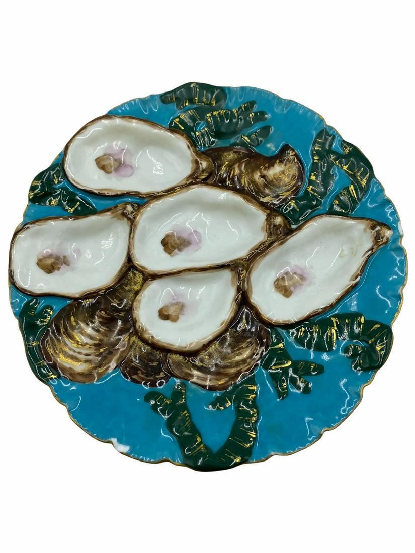 Haviland and Co. Limoges France Porcelain Turkey Oyster: Haviland and Co. Limoges France Porcelain Turkey Oyster Plate measures DIA: 8 1/2". Has a small chip, sold as is