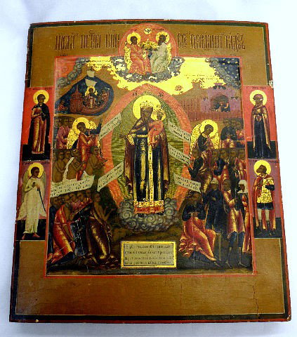 Antique Rare Russian Icon: Antique Russian Icon depicting pictures of Saints throughout on wood. Backstamp says Montreal Canada. 12 1/4" x 10 3/4" x 3/4" depth. SHIPPING & REQUIRED INSURANCE $25.00 SHIPPING AND REQUIRED INSURAN