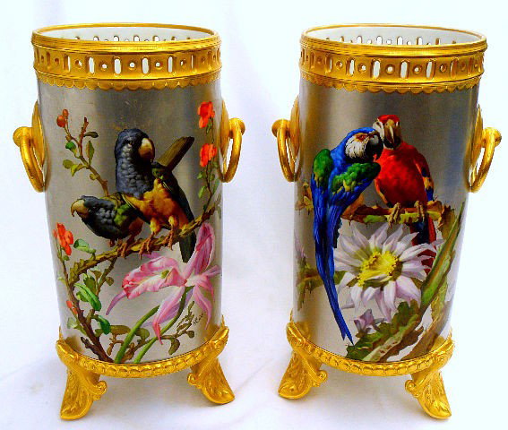 Pr. French Polychrome N. Vivien Garniture Vases: Pair French polychrome asesthetic platinum ground pair of hand painted porcelain N. Vivien garnitue two handled and footed Vases. These vases depict a hand painted bird figure on branches accented wit
